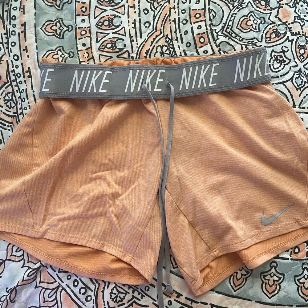 XS soft orange Nike shorts